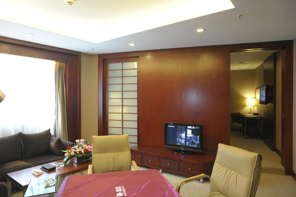 Wuhan Junyi Dynasty Hotel Quarto foto
